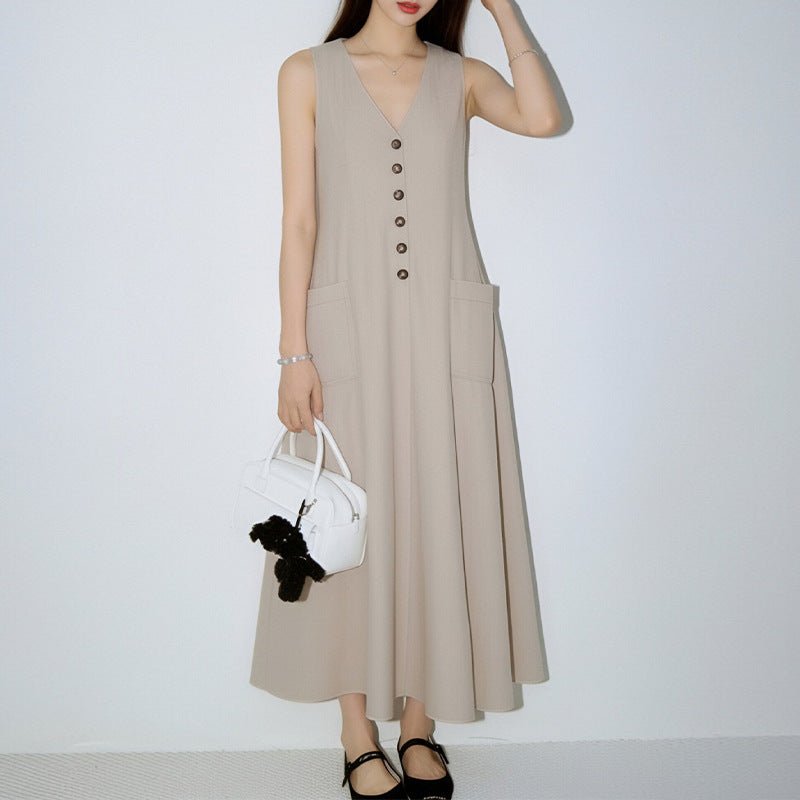 Women's V-neck sleeveless button-up pencil dress by Plush Fashion Hub, casualwear with fitted silhouette and elegant design.