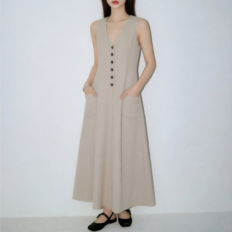 Women's V-neck sleeveless button-up pencil dress by Plush Fashion Hub, casualwear with fitted silhouette and stylish design.
