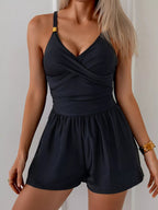 Women's V-neck spaghetti strap one-piece swimsuit by Trendsi, featuring a stretchy fabric, ideal for beachwear and swimming.