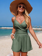 Women's V-neck spaghetti strap one-piece swimsuit by Trendsi, featuring a stretchy fit and stylish beachwear design.