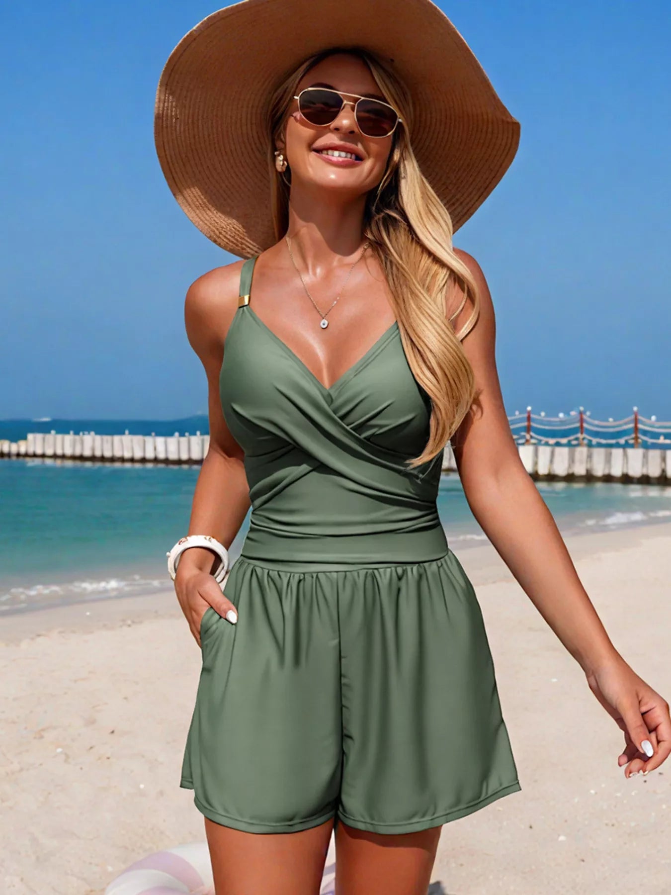 Women's V-neck spaghetti strap one-piece swimsuit by Trendsi, featuring a stretchy fit and stylish beachwear design.