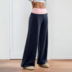 Women’s wide-leg patchwork pants by Plush Fashion Hub, casualwear with a relaxed fit and stylish patchwork design.