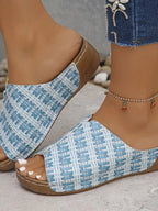 Women's woven platform wedge sandals by Trendsi, featuring a stylish woven pattern and summer-ready comfort design.