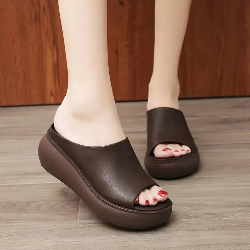 Women fashion platform wedge heel sandals by Trendy Attic Store01, featuring open toes and ankle straps in tan color.