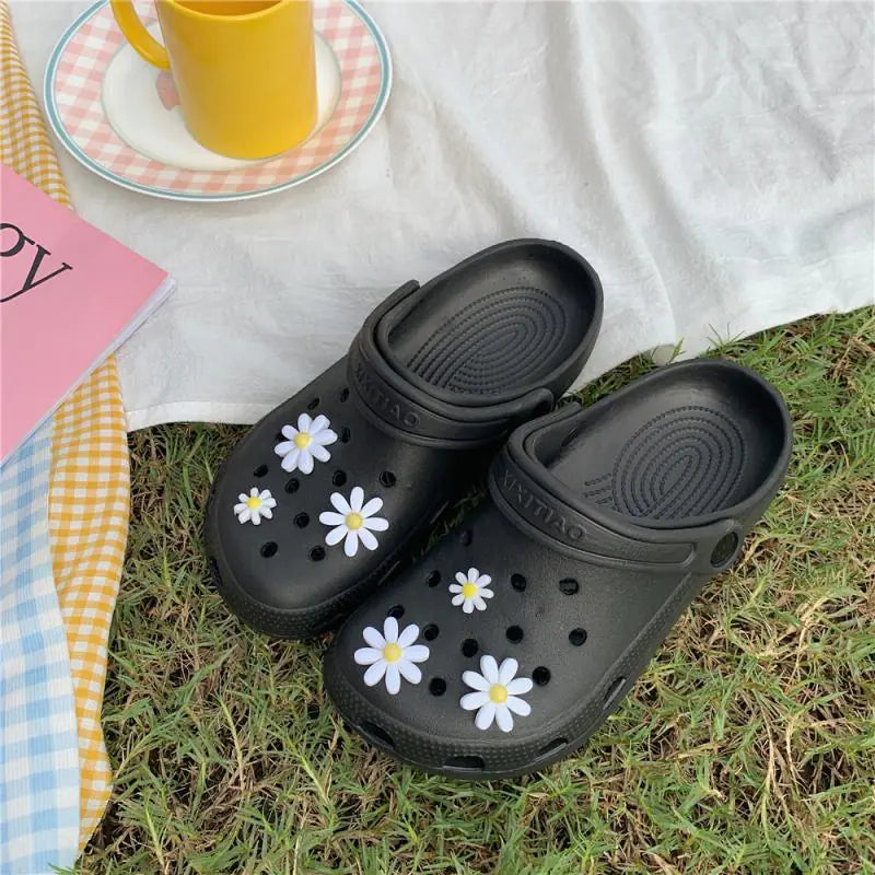 Women’s summer hole sandals by Trendy Attic Store01 featuring open-toe design and casual slip-on style.