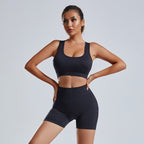 Women's yoga set with a sleeveless vest and matching shorts from Plush Fashion Hub, designed for activewear and workout comfort.