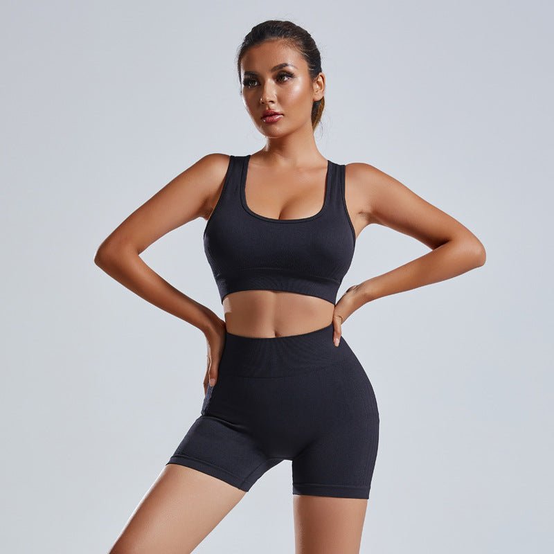 Women's yoga set with a sleeveless vest and matching shorts from Plush Fashion Hub, designed for activewear and workout comfort.