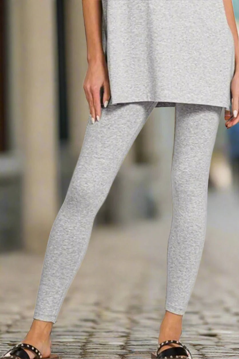 Comfortable Zenana cotton round neck top and leggings set in casualwear style, perfect for relaxed everyday wear.