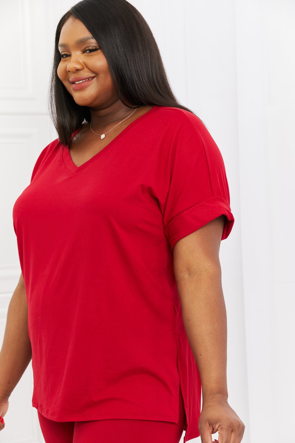 Women’s burgundy brushed V-neck lounge top and biker shorts set by Trendsi, cozy and stylish for relaxed wear.